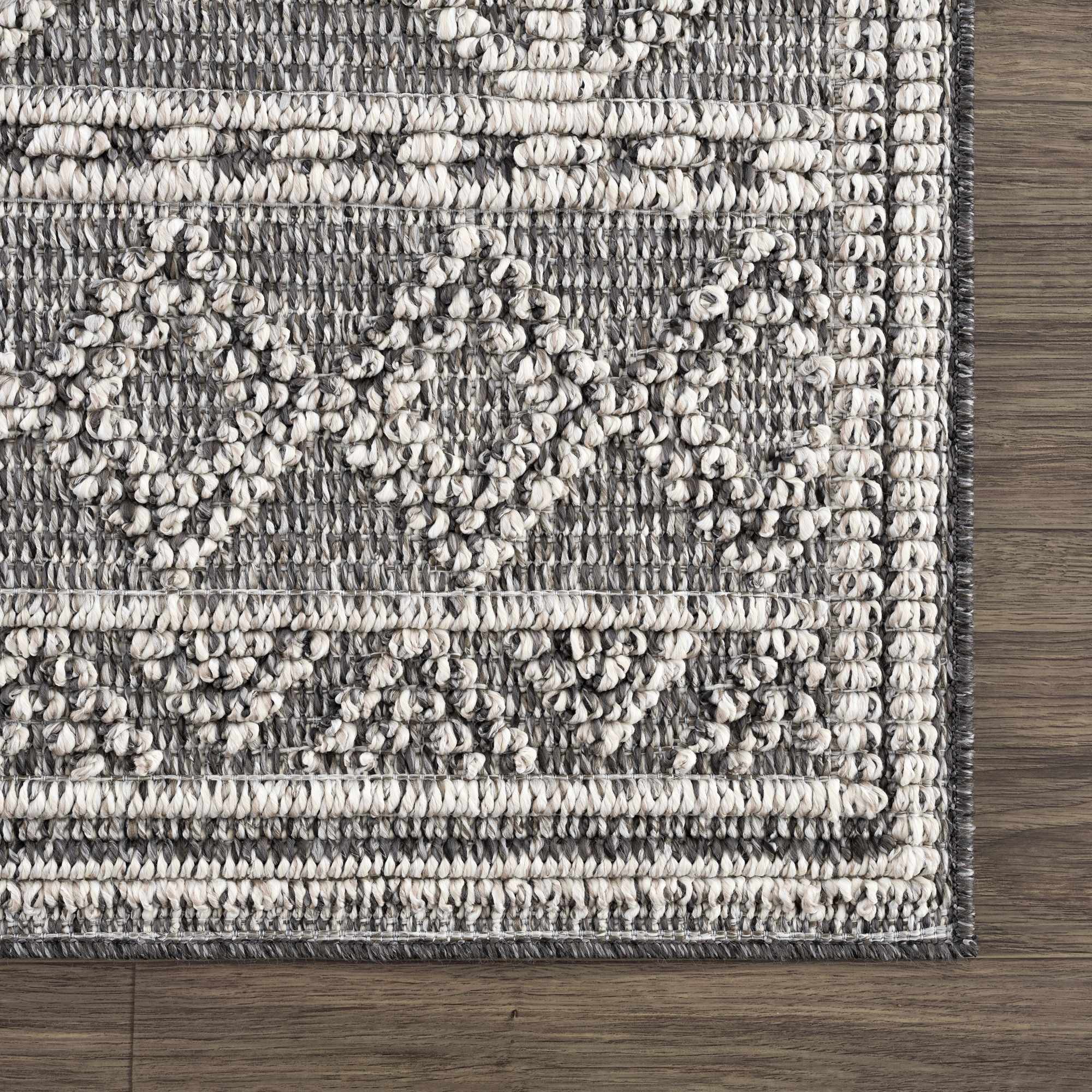 Diah Black & Bone Outdoor Area Rug