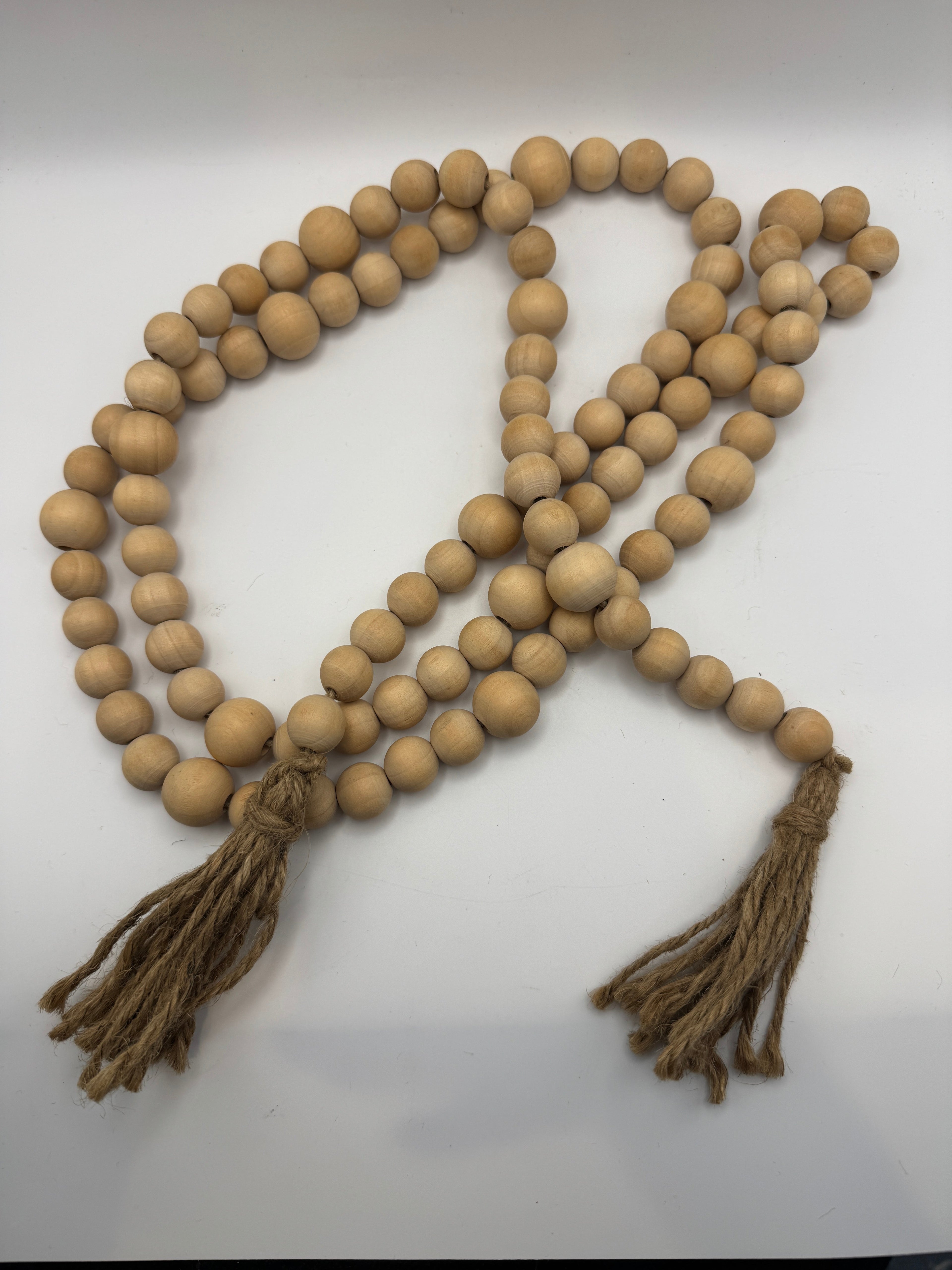 Natural Wood Beaded Garland with Jute Tassels – 70"